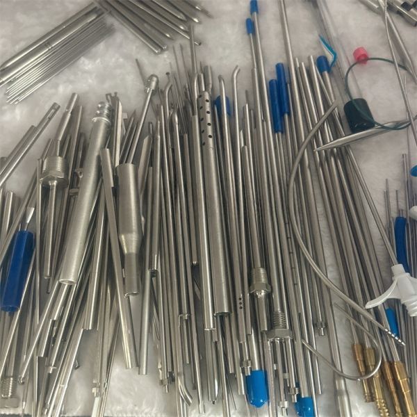 Customized processing of sandblasting scale for stainless steel capillary slotted flared reducing head.