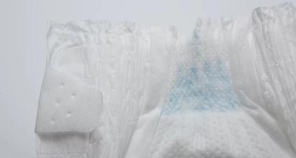 Vente en gros de couches pour bébé jetables en coton comprimé à absorbant respirant vers l'Afrique
