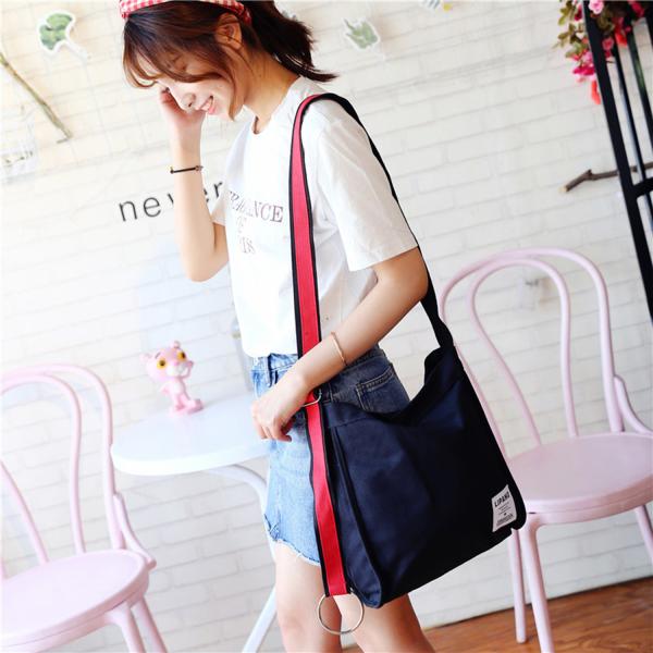 New canvas small ring shoulder Messenger bag simple portable leisure Joker bag women