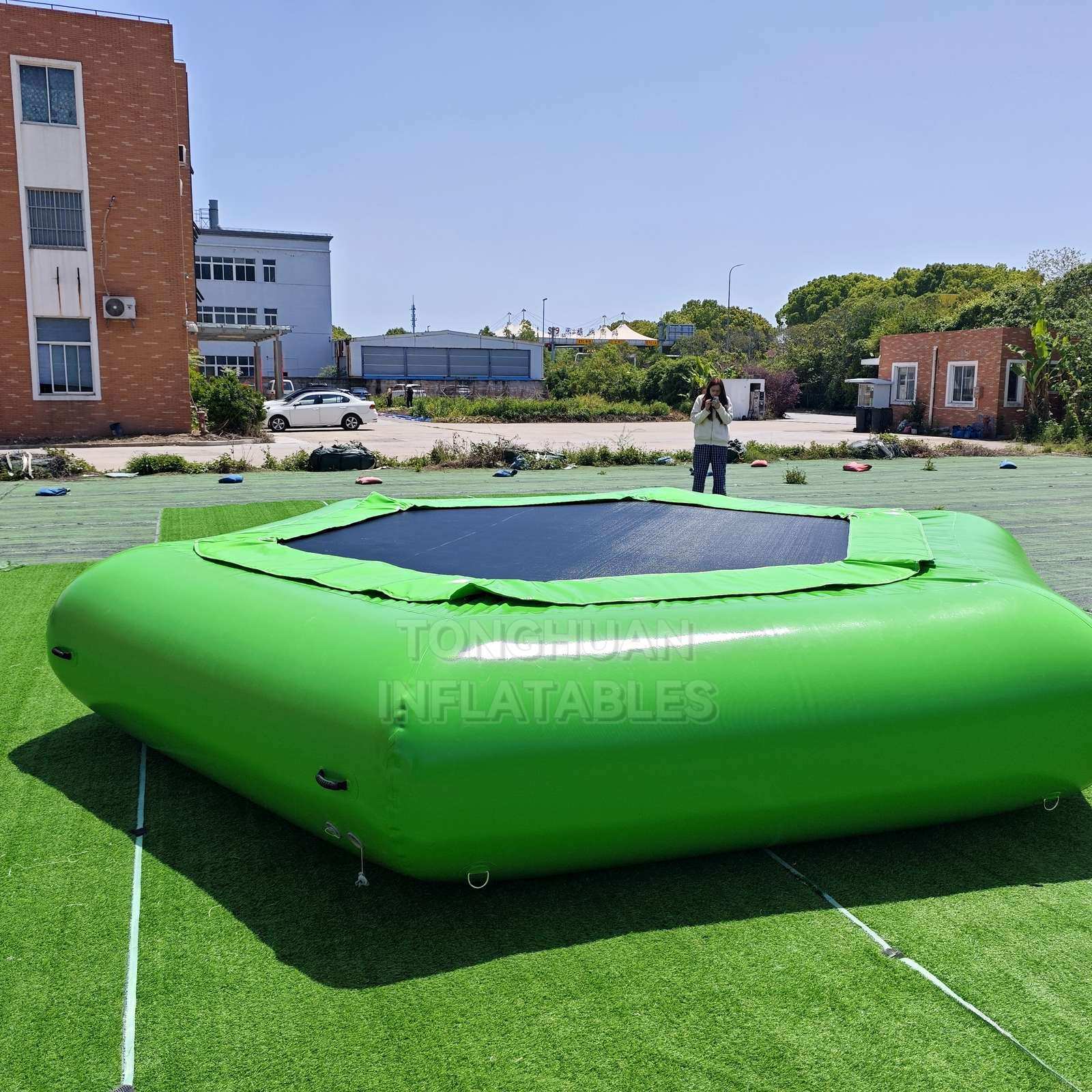 Commercial Inflatable Floating Water Trampoline with Reinforced Jumping Mat and Anchor Points for Lakes Resorts and Water Parks