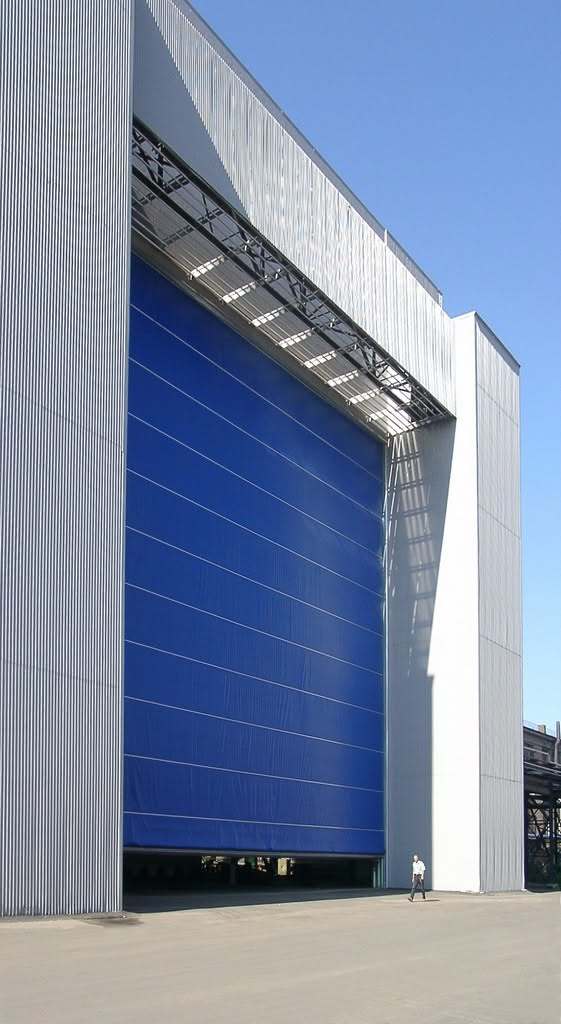 Flexible PVC Fabric Rapid Roll Up Door High Cycle Operation For Warehouse Logistics