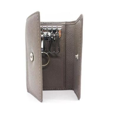 la nomenclature de 10x7.3x2cm a gravé la caisse en refief principale en cuir de support, organisateur principal du portefeuille des hommes 1pc/Ploybag
