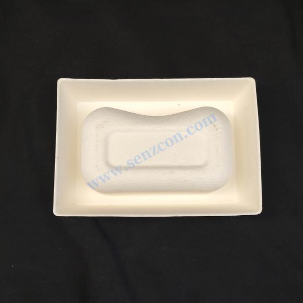 Manufacture of electronic eye - care massage glasses' inner lining packaging bases with white sugarcane pulp pulp molding, which have the functions of shock resistance and fall prevention.