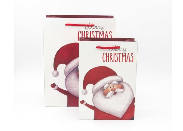 O presente engraçado luxuoso do Natal ensaca a impressão elegante da tela da aparência