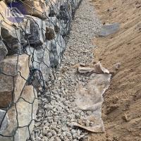 Mure de soutènement en gabion double filet de fil d'acier tissé tordu et géotextile pour projet de construction de canal