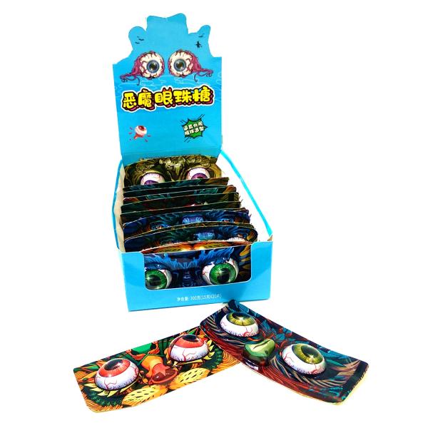 Зрачок внешнего вида сыча формирует конфету конфеты хеллоуина сладкую кислую камедеобразную