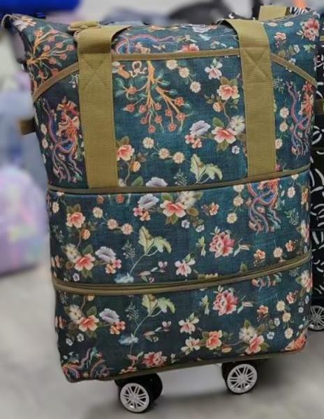 Fabricantes Venda direta Saco de viagem de rodas dobrável de grande capacidade durável para o exterior