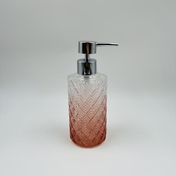 Les accessoires de salle de bains en verre orange de luxe ont une forme ronde avec un motif diamanté