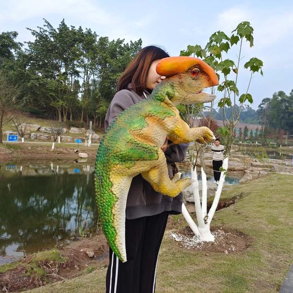 Títere de mano de dinosaurio bebé realista para espectáculos