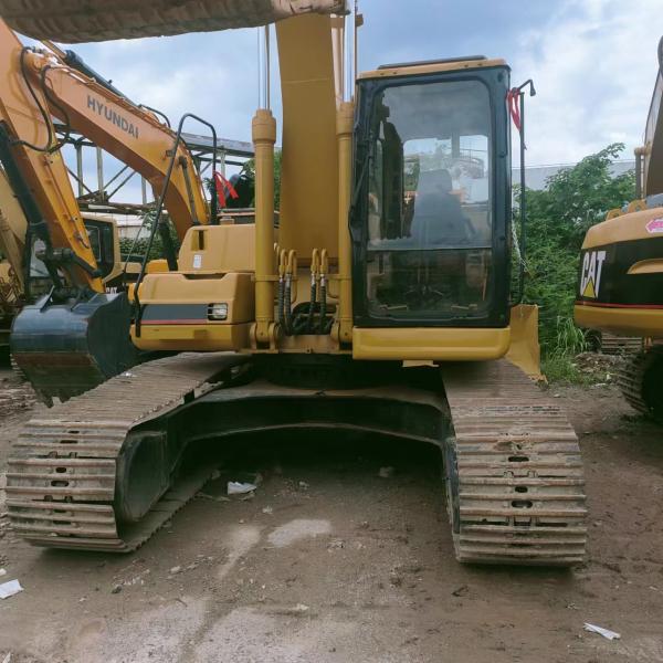 Подержанный экскаватор категории 325B с оригинальным гидравлическим цилиндром и весом 28600 кг.