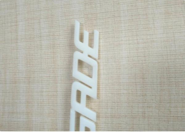 White / Ivory Automotive Plastic Injection Molding Custom Vehicle Logos Sub Gate Type
