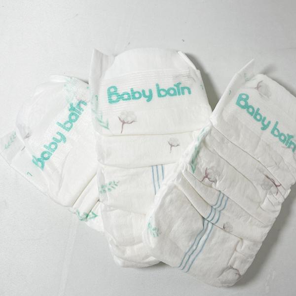 Нежность зеленой пеленки младенца ADL устранимой сухая с волшебными лентами