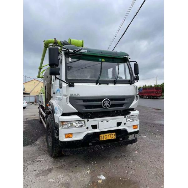 White Concrete Pumping on Heavy-Duty Equipment with Hydraulic Concrete Boom Pump