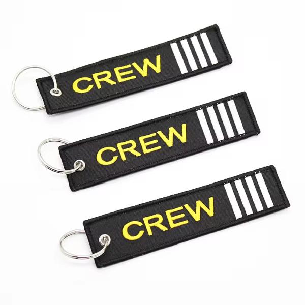 Wholesale Olecranon Hook Cheap Custom Flight Fabric Embroidery Jet Tag Woven Keychain With Your Own Logo