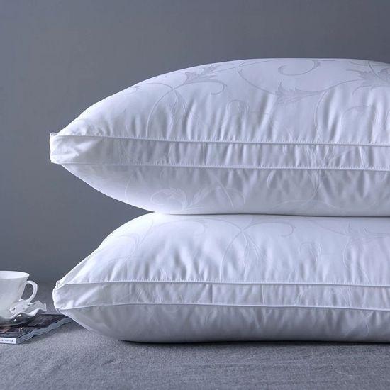 Disfrute del lujo con almohadas de hotel de lujo llenas de microfibra e instrucciones de cuidado lavables en máquina