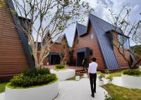 Les cabines préfabriquées La petite société de log house avec un cadre en acier léger Belle maison en bois Resort Bunglalow