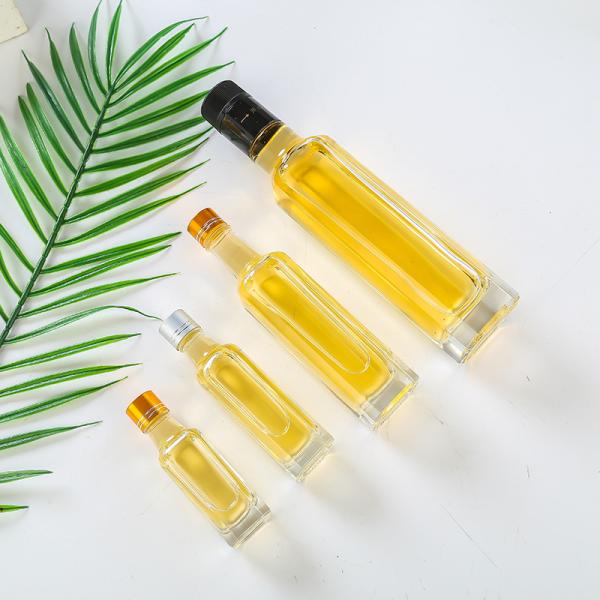 Botella de vidrio de distribución de aceite de oliva para cocina Botella de vidrio personalizada 50ml 100ml 500ml