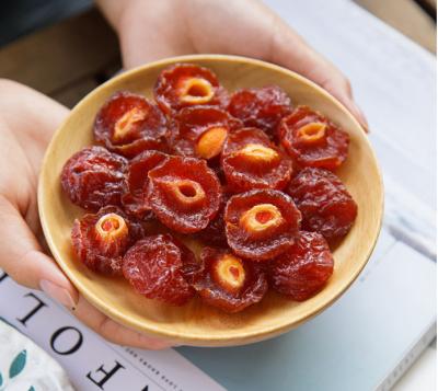 O fruto preservado delicioso chinês com ameixas secas vermelhas secou Rose Plum