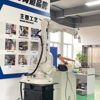 Le robot de soudage à l'arc industriel utilisé par ABB est un palettiseur IRB1600-10/1.45