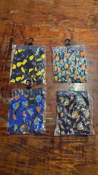 Stock Lots Men′ S Sexy Underwear Waistband Striped Box Pants Elastic Letter Seamless Stock Underwear Breathable Comforta