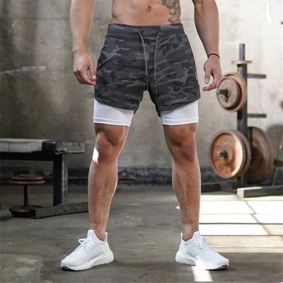 Homem elástico Mesh Athletic Shorts With Pockets do short do exercício da compressão da cintura