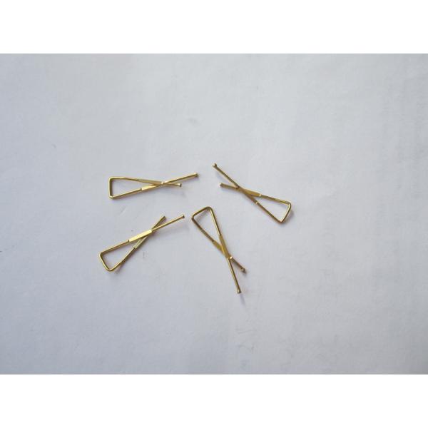 Brass X shaped clip for t-shirt