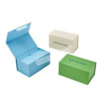 Boîtes pliantes de papier texturé recyclable
