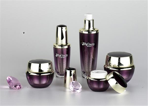Transparent And Purple Empty Makeup Bottles With A Metallic Color