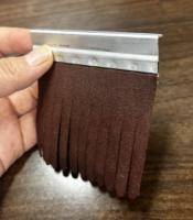 L'utilisation de la bande de papier de sable pour le polissage de meubles