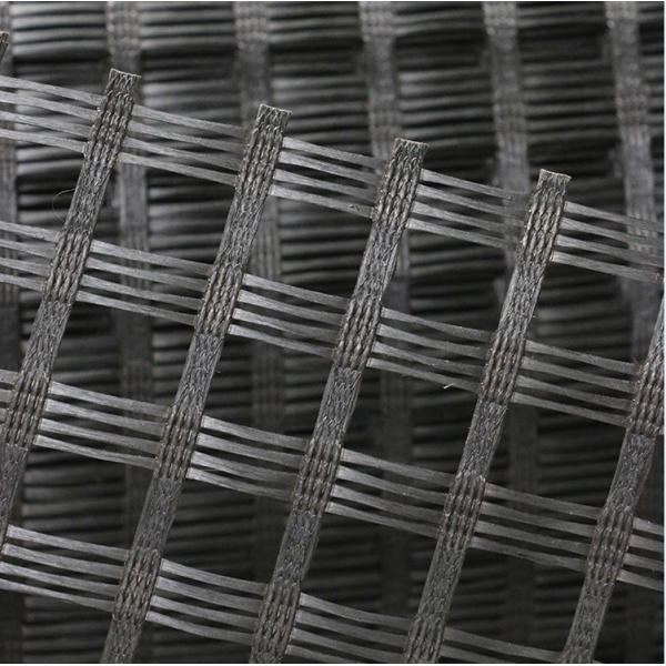 Revestimiento de asfalto autoadhesivo de fibra de vidrio Geogrid 50KN Para pavimentación de carreteras Refuerzo de carreteras