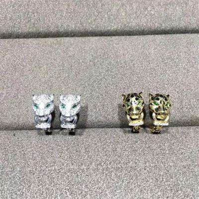 C Cheetah Earrings - showing the charm of courage, naughty or docile .18K gold, lacquer, diamond, shafle garnet, Onyx