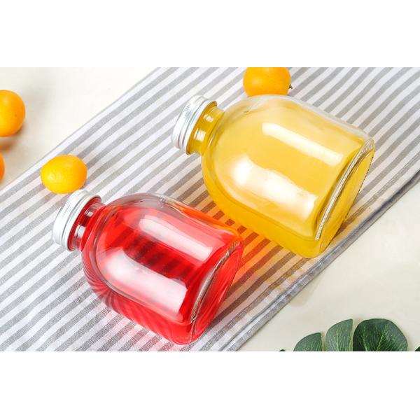 На открытом воздухе бутылка холодного напитка 500мл, особенная круглая форменная стеклянная бутылка духа