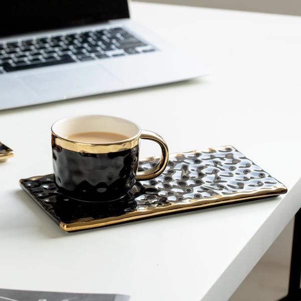Elegant Black Ceramic Mugs With Gold Accents Wavy Textures For Coffee Tea Pastry Pairings Modern Minimalist Design