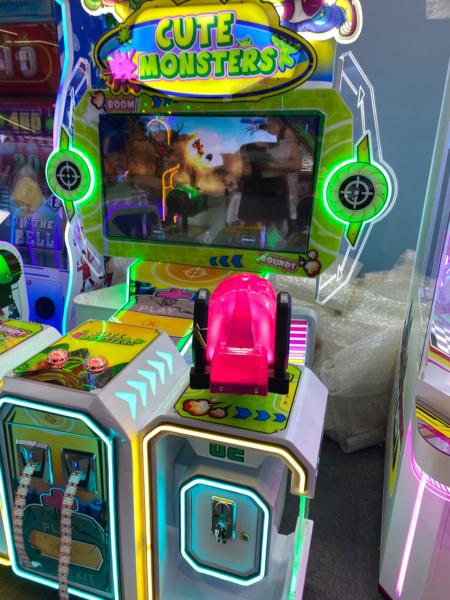 A moeda da loteria Defender operava o jogo de tiro com arma monstros máquina de resgate de bilhetes
