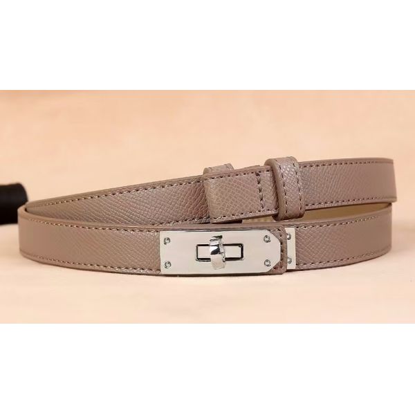 Adjustable belt, alloy buckle, leather texture, fashion accessory, minimalist design, skirt accessory, dress accessory