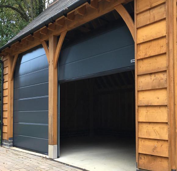 Sectional Overhead Door 50mm-80mm Thickness Insulated Sectional Garage Door For Mall And Commercial