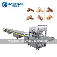Machine à enrobage de barres céréalières au chocolat