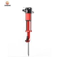 petite pioche tenue dans la main hydraulique de Jack Hammer Flat And Pointed
