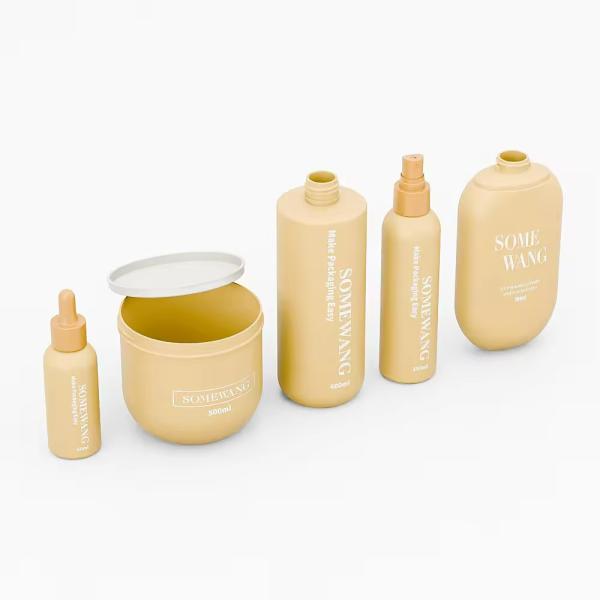 Customized Cosmetic Bottles And Jars Yellow Cosmetic Packaging Set Leak Proof
