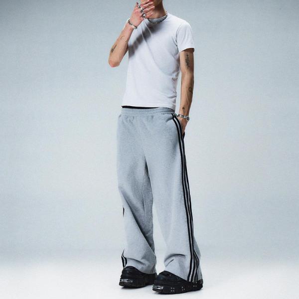 Fabricants de vêtements personnalisés de haute qualité lavage à l' acide en blanc empilé Jean Denim empilé Sweatpants jambe droite avec rayures