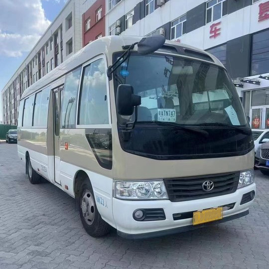 7005*2040*2785mm Toyota Coaster 30 Place Seat Mini Bus with Seat Capacity of 17-30