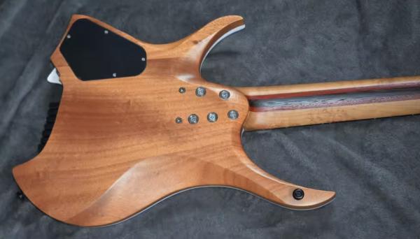 2025 Fanned Frets 7 Strings Headless Electric Guitar White Color with Eye Poplar 5-ply Roasted Maple