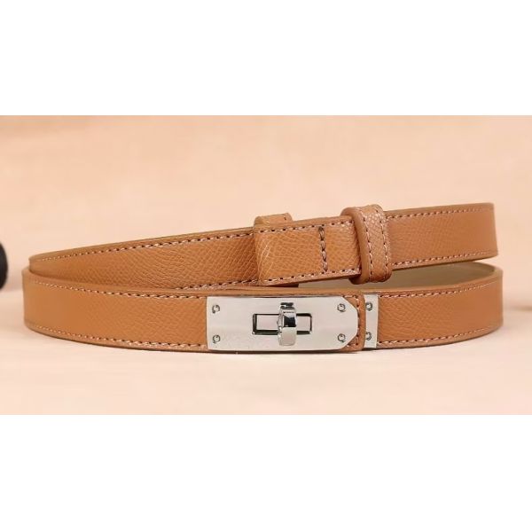 Adjustable belt, alloy buckle, leather texture, fashion accessory, minimalist design, skirt accessory, dress accessory