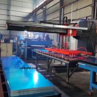 Machine à palettiser installée au sol avec servo-moteur