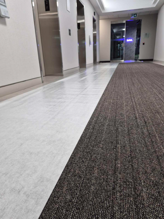 Temporary Floor Protection Protective Layer That Provides Temporary Yet