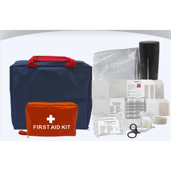 A Home First Aid Kit Containing Emergency Survival Tools Such As a Fire Extinguisher and a Fire Blanket