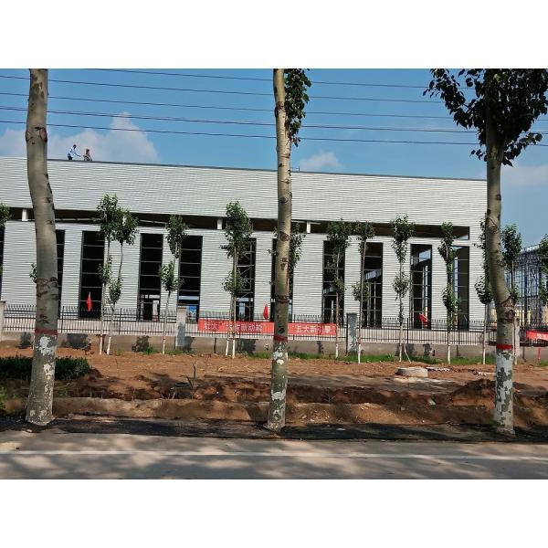 Earthquake Resistant Prefab Steel Warehouse Customize Logo And Slope Roof Buildings
