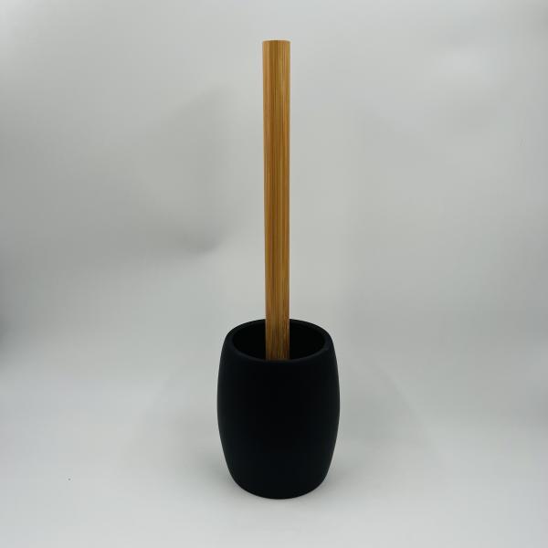 Ensemble de salle de bains en polyrésine noir et blanc en forme ronde en bois avec une partie de savon et un ensemble de comptoirs de salle de bains