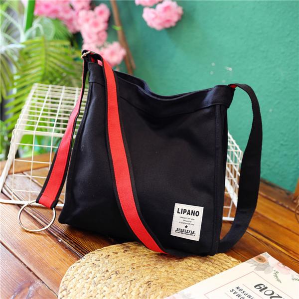 New canvas small ring shoulder Messenger bag simple portable leisure Joker bag women