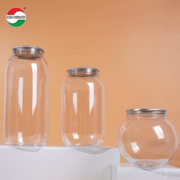 250ml 330ml 400ml 500ml 700ml カスタムサイズ PETボトル 瓶 包装 飲料缶 食品品質のPET素材から製造 透明 プレスカバー 簡単に開いた蓋